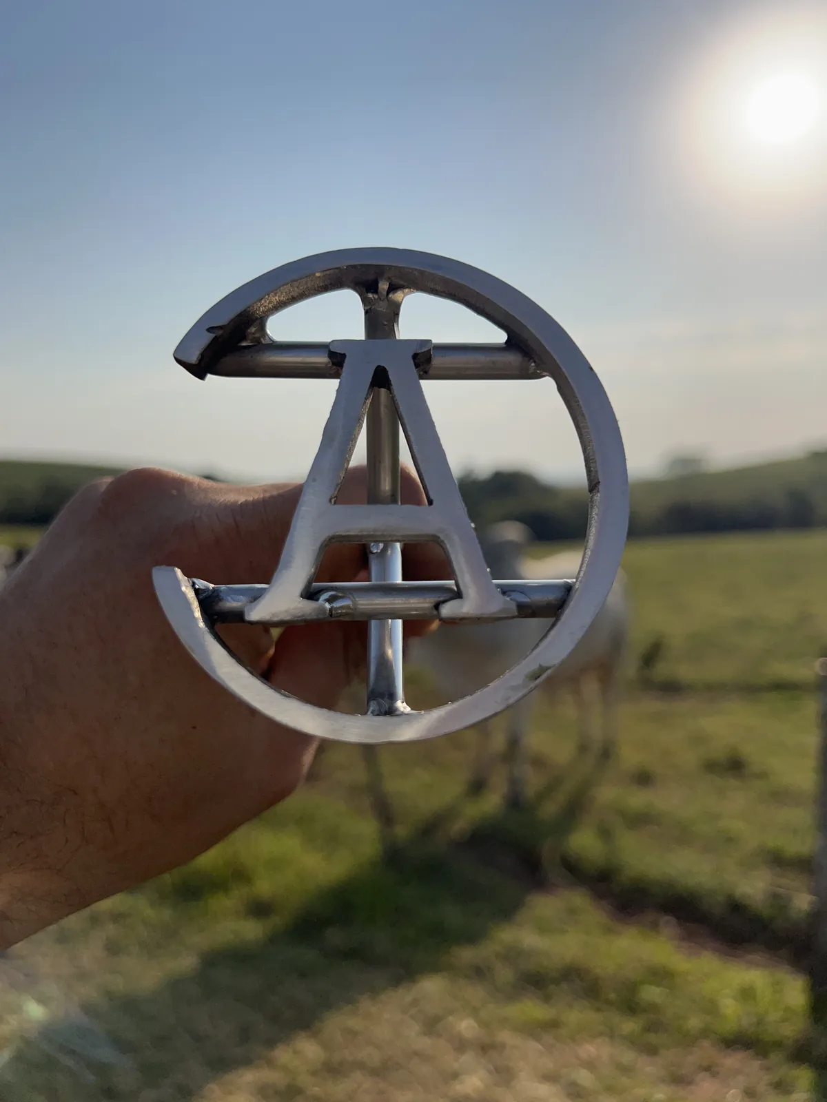 Marcador alfabético em aço inox, letra A dentro de círculo